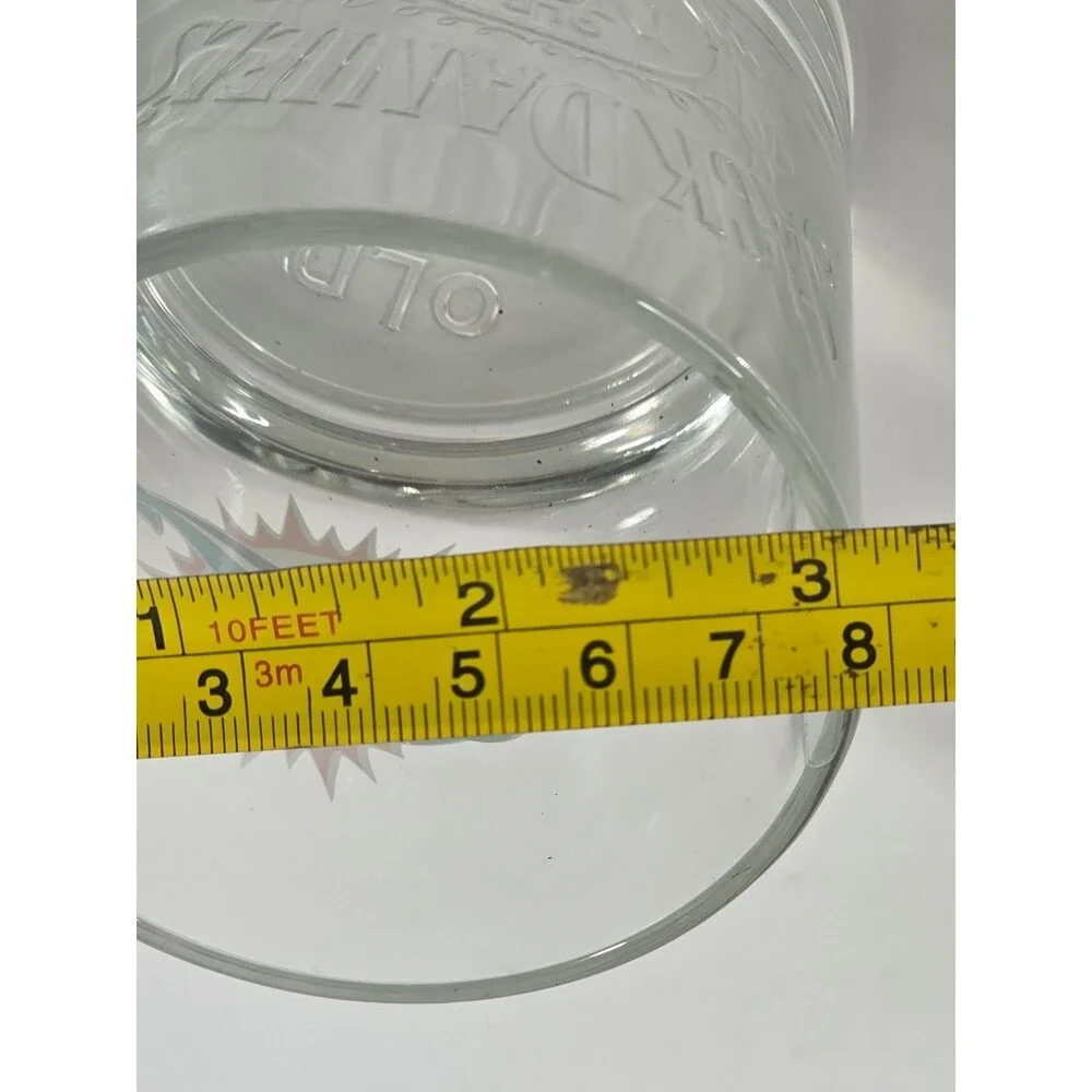 Jack Daniel's promotional NFL rocks glasses featuring the Miami Dolphins logo
